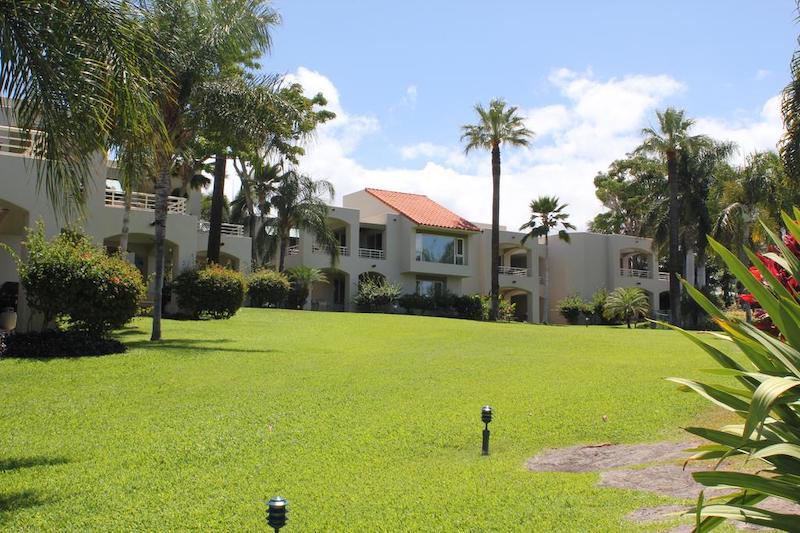 Manicured grounds surround the Palms at Wailea