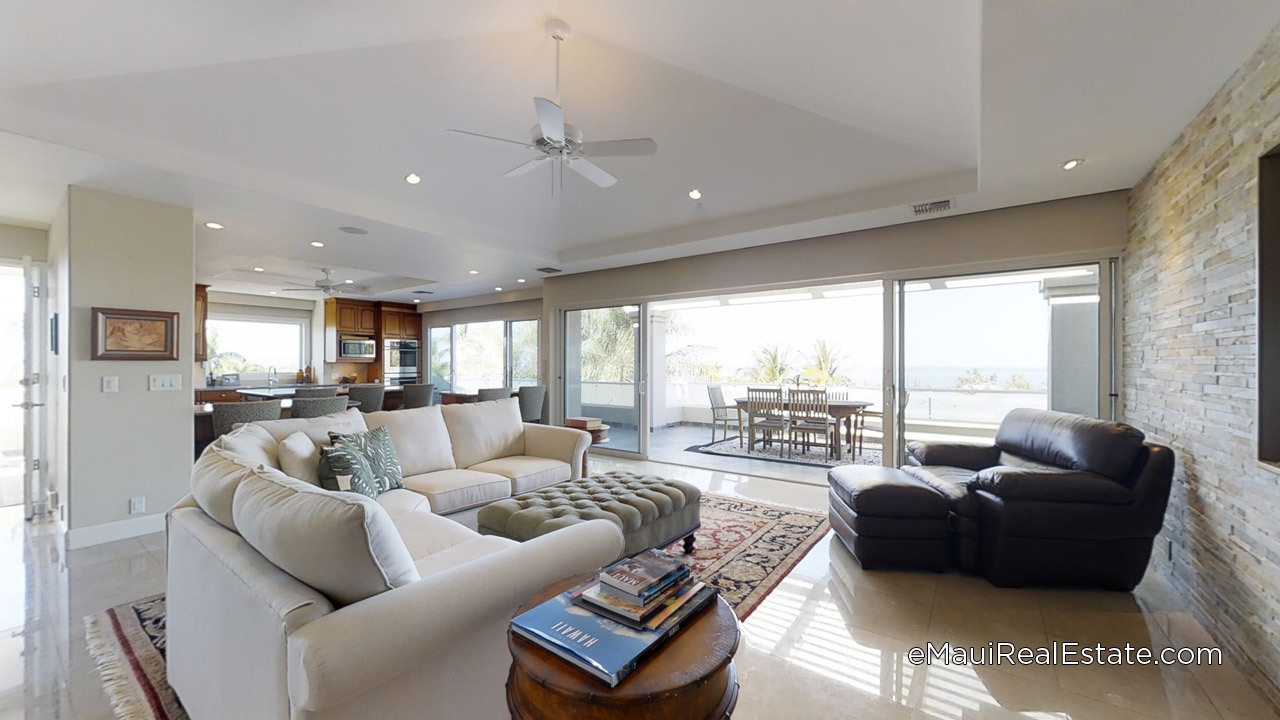 Living rooms in Wailea Pualani are designed to be bright and open and oriented to take advantage of the ocean views