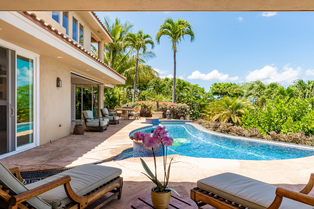 Graceful indoor & outdoor living: Relax on the covered lanai area.